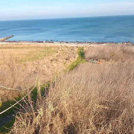 Cozy Beachfront בית נופש